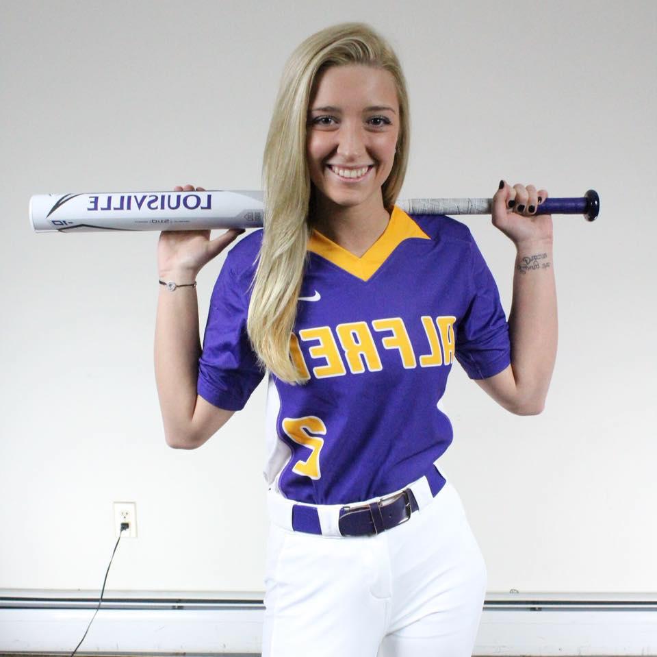 Lu Krawczyk posing in softball uniform