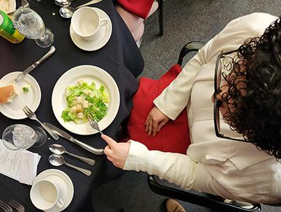 image of student eating salad